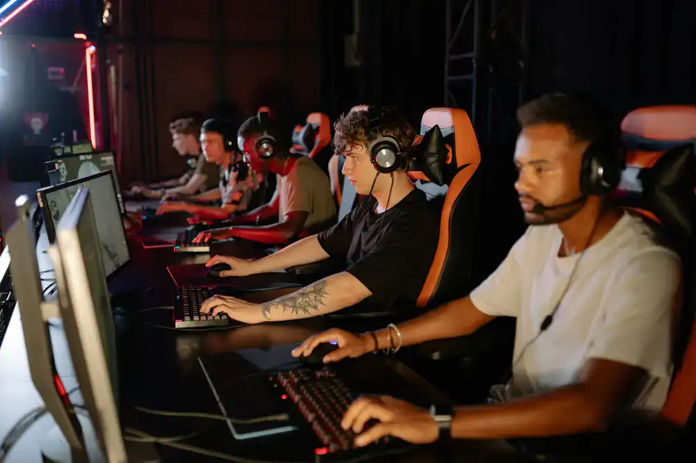 Amateur esports team discussing strategy before a match